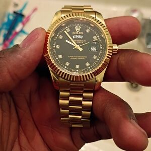 Rolex Gold Watch with Black Dial